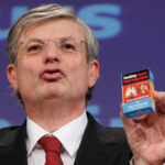 Tonio Borg shows off the planned new cigarette packet design